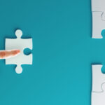 Symbolbild "Hand fitting puzzle piece". Copyright: Who is Danny - stock.adobe.com