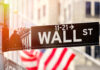 Wall Street in New York City at sunset