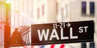 Wall Street in New York City at sunset