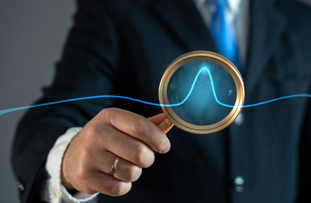 Symbolbild "Investitionsboom" - A businessman studies an abnormal jump on a chart. Sales growth. High profitability. Market demand surges, investment opportunities, stock market fluctuations. High profitability. Copyright: Andrii Yalanskyi - stock.adobe.com