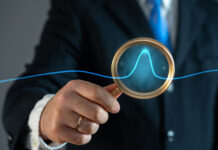 Symbolbild "Investitionsboom" - A businessman studies an abnormal jump on a chart. Sales growth. High profitability. Market demand surges, investment opportunities, stock market fluctuations. High profitability. Copyright: Andrii Yalanskyi - stock.adobe.com