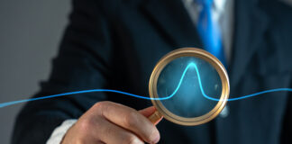 Symbolbild "Investitionsboom" - A businessman studies an abnormal jump on a chart. Sales growth. High profitability. Market demand surges, investment opportunities, stock market fluctuations. High profitability. Copyright: Andrii Yalanskyi - stock.adobe.com