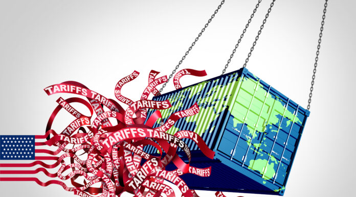 US Global Tariffs Crisis and United States Tariff confusion as an international trade war with American imports and exports tax on the globe as economic turmoil and uncertainty on world markets. Copyright: freshidea - stock.adobe.com