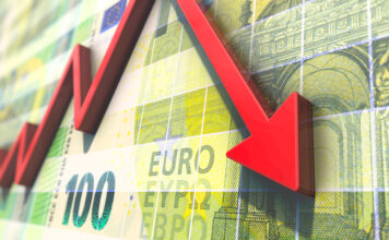Symbolbild: Abstürzender roter Graph auf Gelddiagramm. Copyright: bluedesign - stock.adobe.com