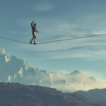 Symbolbild. Young man walking in balance. Copyright: Orlando Florin Rosu - stock.adobe.com
