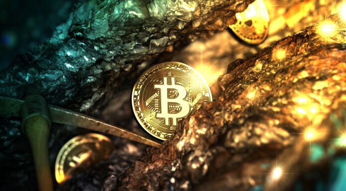 „Bitcoin Treasury ist der absolute Kern unseres Modells“ Symbolbild: "Golden bitcoin mining in deep golden cave with Pickaxe and some coin. - 3d illustration". Copyright: Paradorn - stock.adobe.com