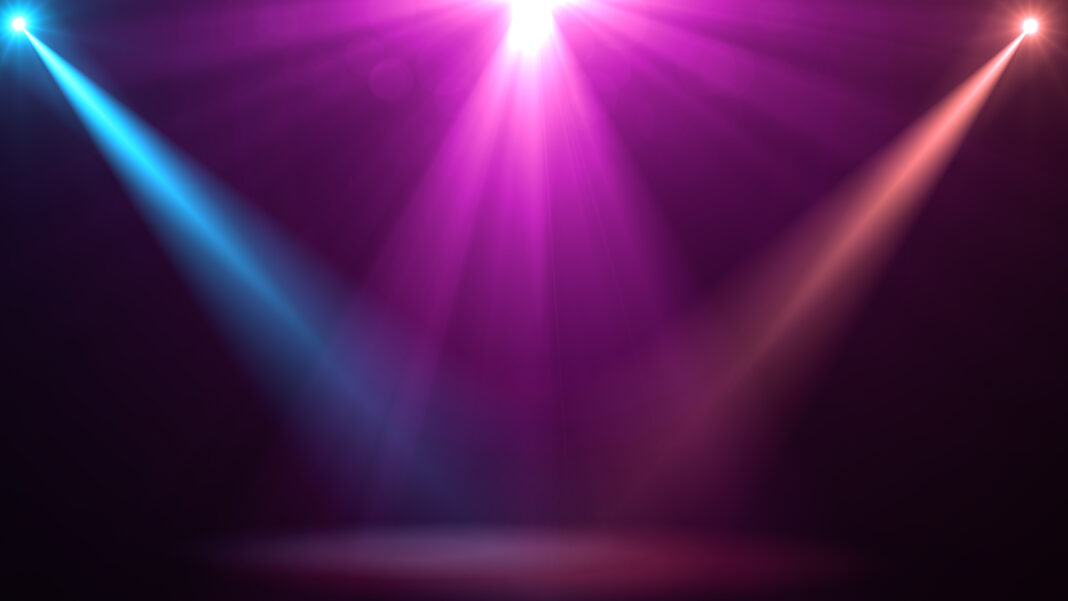 abstract of empty stage with colorful spotlights or Several brig Symbolbild "Spotlight on surface". Copyright: sanee - stock.adobe.com