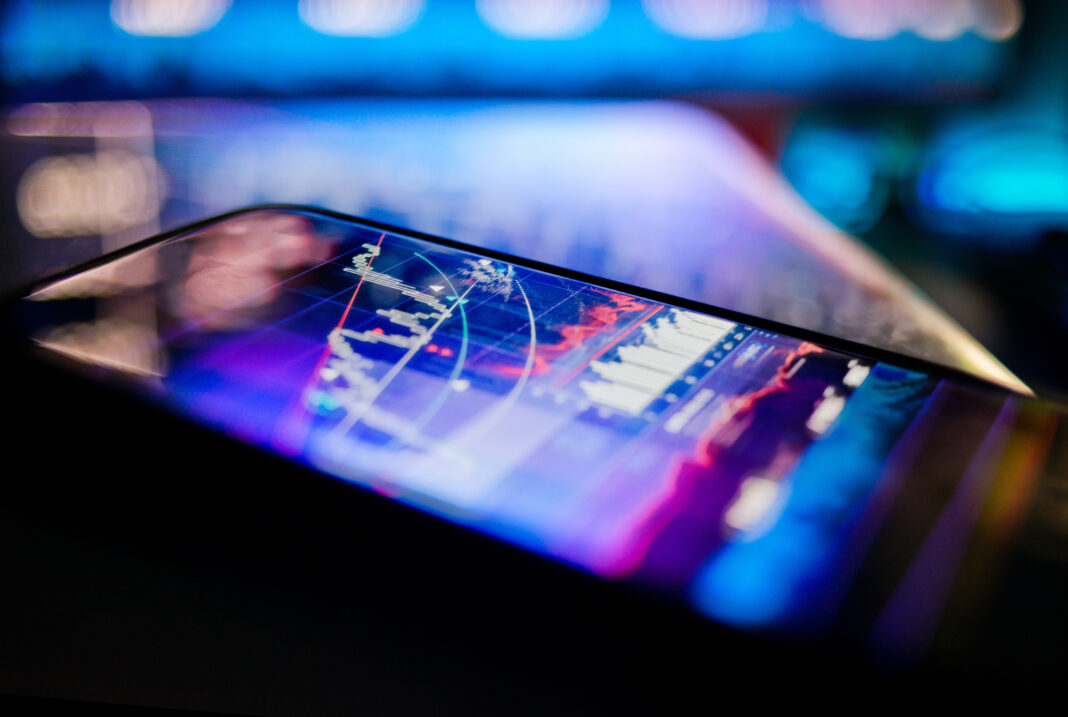 A mobile device being used to display business data.