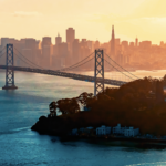 JPM 2026: Von Modalitäten zu Umsetzung Symbolbild. Aerial view of the Bay Bridge in San Francisco, CA. Copyright: Tierney - stock.adobe.com