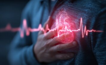 Revier Therapeutics – 6 Mio. EUR Seed für neue Klasse von Herz-Kreislauf-Medikamenten Symbolbild. (A person clutching their chest with a glowing heart symbol indicating pain or health issue.) Copyright: Zahid - stock.adobe.com